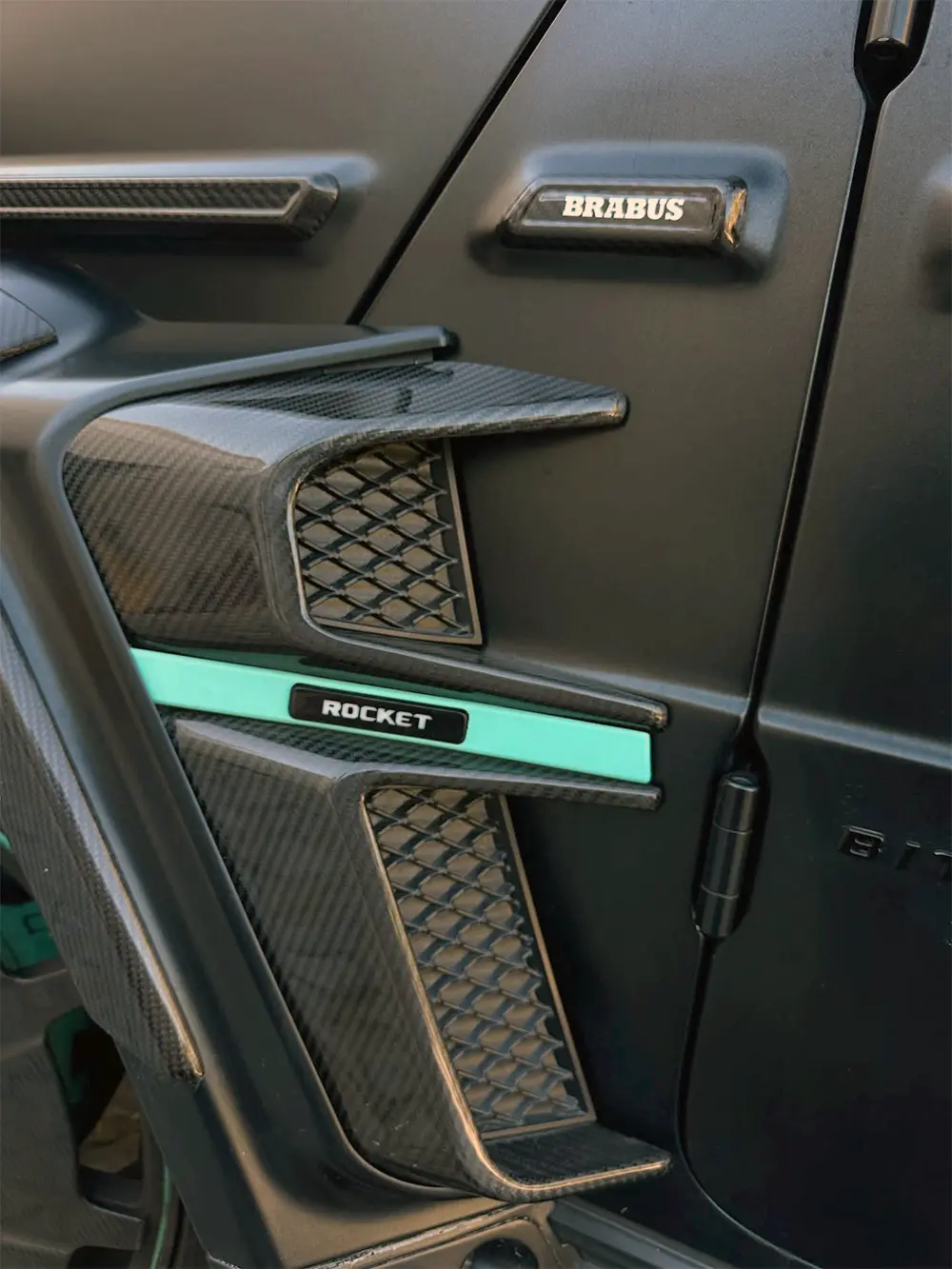 Close-up of Brabus Rocket carbon-fibre bodywork after detailing